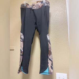 Camo, black, teal leggings. Size medium. tie waistband and back zipper pocket